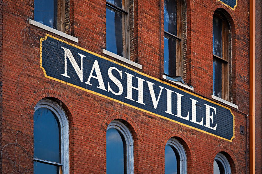 Nashville, TN - Closeup of Historic Brick Building with Nashville Lettering Written on the Side